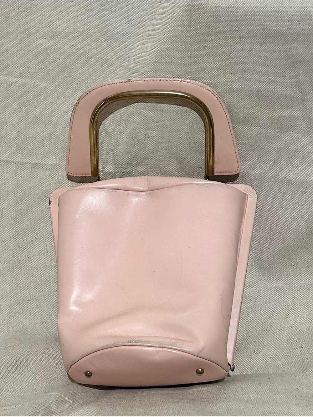 Vintage pastel pink handbag.
